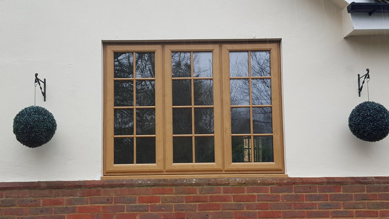 Irish Oak PVCu window with surface mounted Georgain bars.jpg
